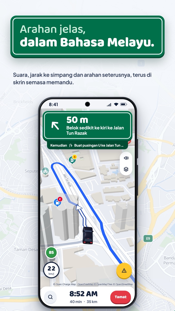 Arahan memandu dalam Bahasa Melayu dengan papan tanda di skrin